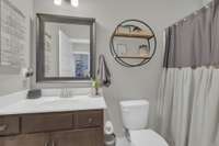 Second bathroom allows guests all the amenities with a tub/shower combo.