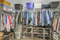 Enough room for 2 peoples clothing in this HUGE walk in closet.