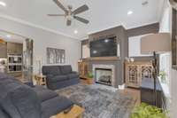 Snuggle up in front of the gas fireplace to watch tv or wrestle around with your fur baby after a long work day.