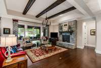 Cozy living area with rock gas fireplace