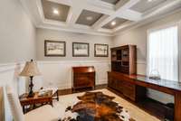 Office with coffered ceilings for added elegance