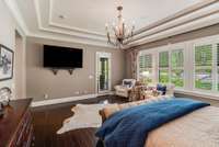 Master Bedroom has doorway to covered porch
