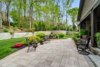 Additional paved patio off covered porch