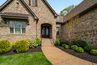 Beautiful entrance with iron double doors
