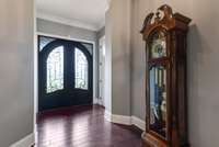 Large entryway with coat closet