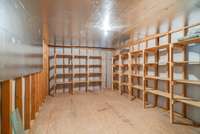 HUGE storage area with shelving upstairs