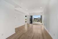 Massive 23 x 14 primary suite with sitting area and private deck