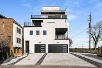 The B unit has the two car garage to the right. The C unit studio has the single garage to the left.