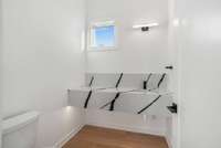 Top floor powder room, mirror to be selected