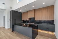 Sub-Zero 48" Cabinet paneled Refrigerator/Freezer blends in seamlessly...