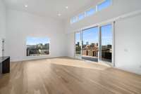 Main floor living / kitchen / dining offering 270 degree condo penthouse views