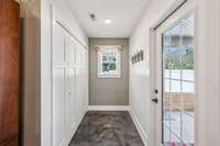 Laundry closet to the left - door access to back porch to the right.