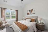 The primary bedroom has two walk-in closets and vaulted ceilings