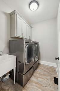 Laundry Room w/ Laundry Sink & More Storage Than You Can Use!