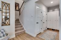 Walk upstairs for the 4th bedroom, which could serve as a second owner's suite, a full bathroom and a living room space.