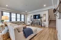The great room will fit two huge sofas or a large sectional without any issues.