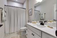 One of two 1st floor full bathrooms