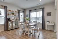 A designated dining area beside the kitchen~  it will fit a large table AND sideboard!