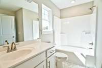 Secondary full bath up.