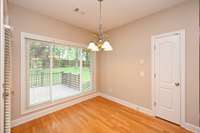 EAT-IN KITCHEN WINDOW OVERLOOKS DECK & BEAUTIFUL BACKYARD