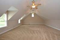 BONUS ROOM WINDOWS PROVIDE PLENTY OF NATURAL LIGHT