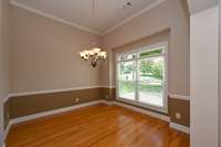 CROWN MOLDING & CHAIR RAIL TRIM IN THE FORMAL DINING ROOM