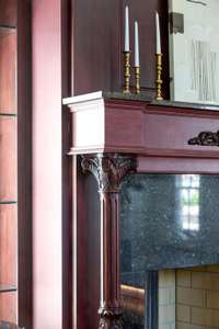 The custom woodwork from the cabinets to this fireplace mantle is really incredible