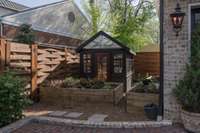 Green house and raised garden area