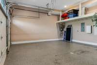 Large three car garage with sink and prep station