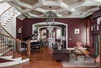 The house opens for guests and draws you through to the kitchen