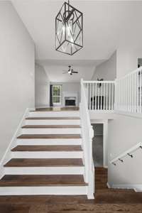 Upstairs, you'll enjoy the main living spaces and 3 bedrooms, including the Primary Suite!