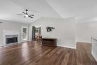 The living area flows seamlessly into both the casual dining nook, more formal dining area and kitchen