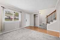 Carpeted living room and LVP throughout.