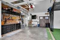 Garage with golf simulator