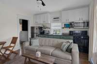Kitchen and den of lockout suite