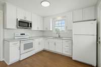 Design staging with white cabinets image (Virtual image)