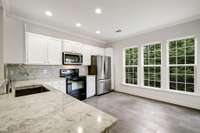 -Kitchen floor and master bath floor are heated! Cabinets professionally painted. New marble countertops and backsplash. New faucets and farmhouse sink!