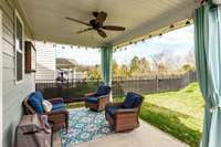 Covered patio with tv mount, ceiling fan, and Trex decking added to extend your outdoor living space.