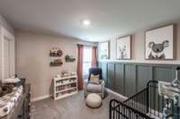Third bedroom with a walk-in closet