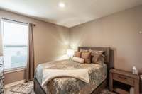 Secondary bedroom downstairs along with full bathroom