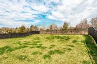 Rare find!!  It's not often that you find a home like this one with no one behind you...and it's already fully fenced and ready to go!