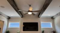 Picture of windows and wood beams in the main living room