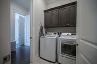 Utility Room located between hallway and Primary closet