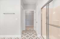 The primary bath also features a water closet, linen closet & walk-in closet.