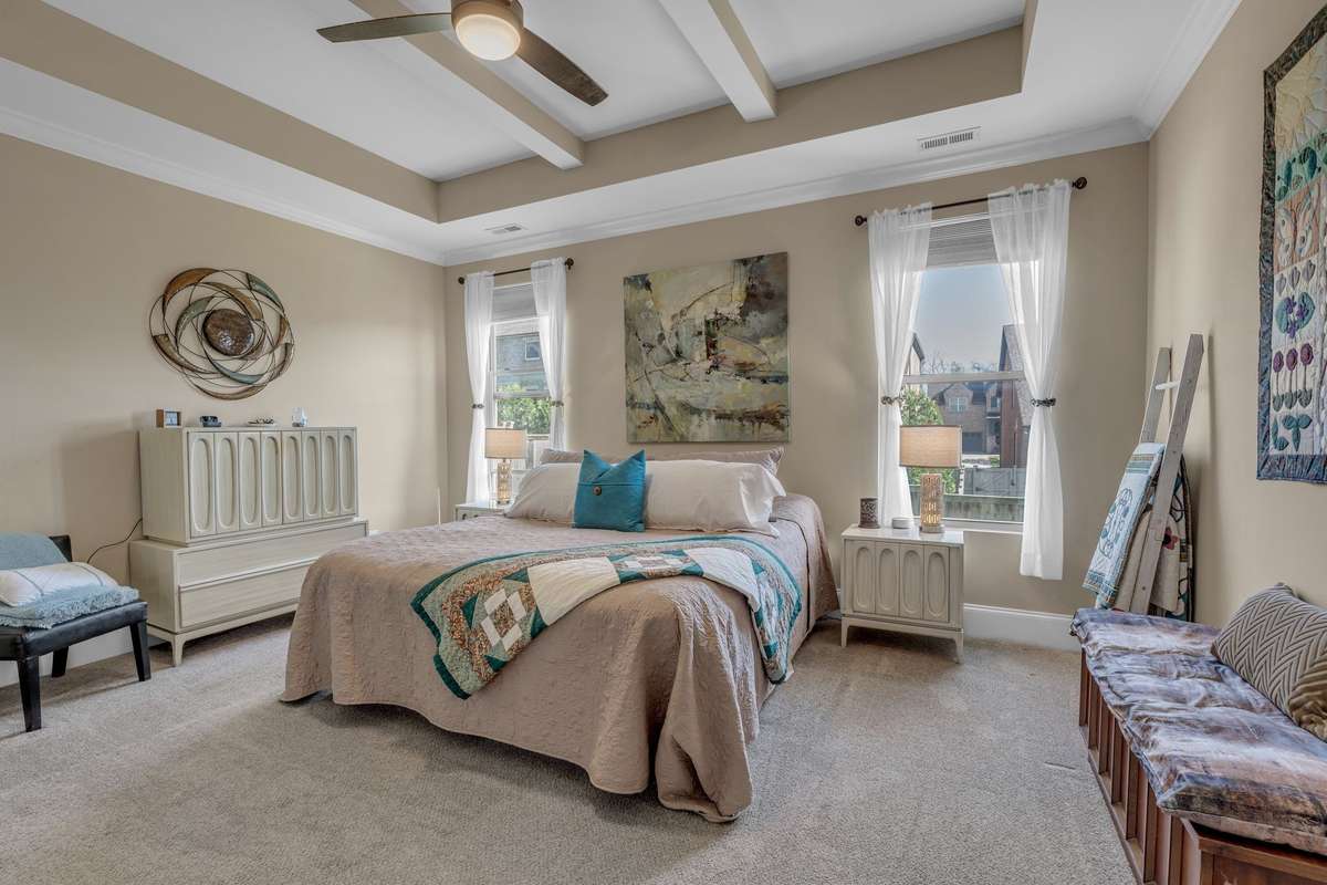 Beautiful Master Bedroom. Look at those Ceilings! And Natural light coming in.