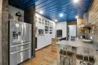 Kitchen with industrial ice maker.