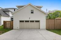 Alley access for the two car garage. The home also features a driveway out front for more parking!