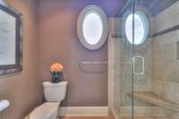 Tiled shower with natural stone