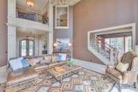 Balcony from the second floor and kitchen is just beyond the staircase
