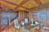 This staircase leads to the master suite on the third floor